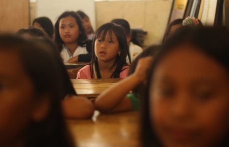 Classroom Management and Family Engagement Leads To Improved Student Academic Outcomes. Two images of students in schools with strong family engagement strategies.